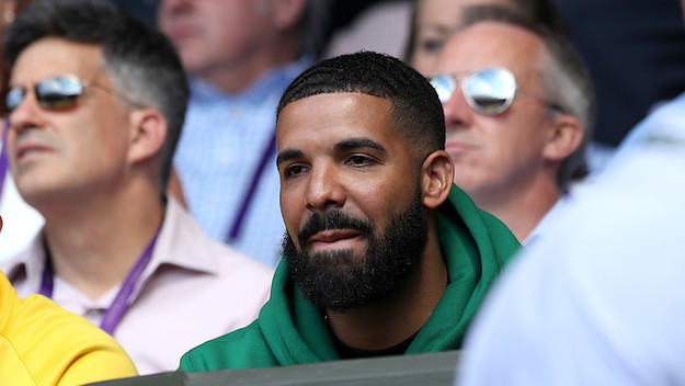 Drake in the stands of centre court watching Serena Williams.