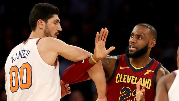 Enes Kanter #00 of the New York Knicks and LeBron James #23 of the Cleveland Cavaliers.
