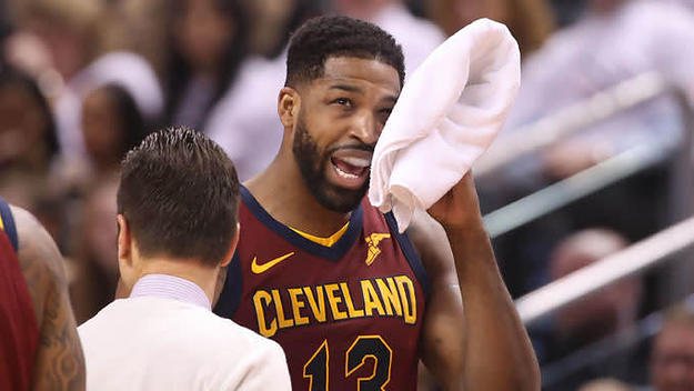 Tristan Thompson wipes down his face
