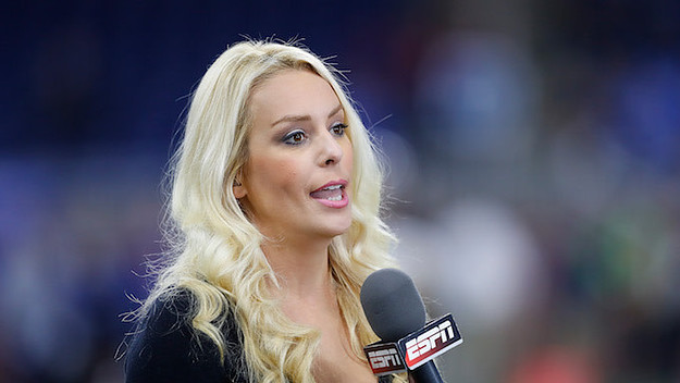 ESPN sideline reporter Brittany McHenry works a pregame broadcast.
