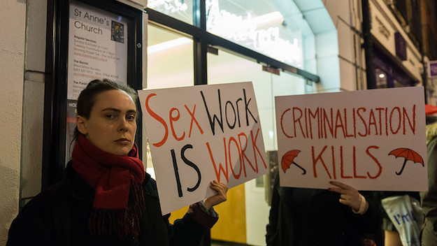 Sex work legalization signs