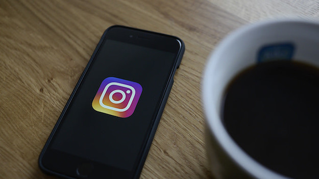The Instagram logo is seen on an iphone.