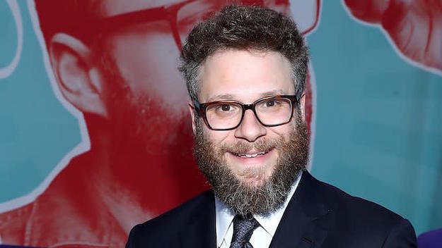 Seth Rogen shows off his specially embroidered bag of Crown Royal XR.