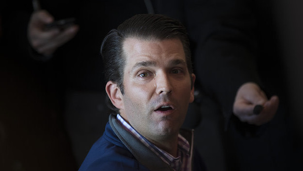 Donald Trump Jr. answers questions from reporters.
