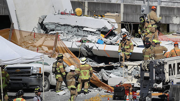 Firefighters at Miami bridge collapse