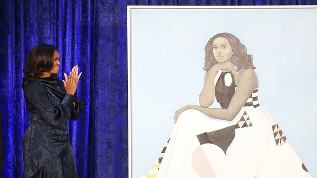 Michelle Obama with her portrait at the Smithsonian's National Portrait Gallery.