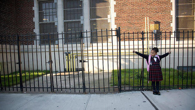 A child waiting outside a Bronx Public School in 2007.