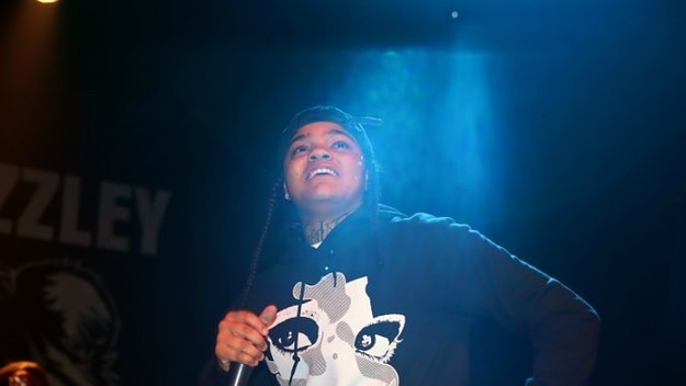 Young M.A performs.