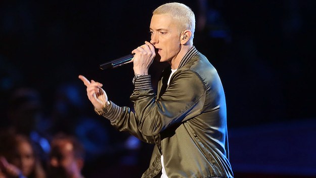 Rapper Eminem performs onstage at the 2014 MTV Movie Awards