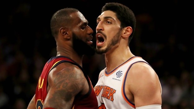 LeBron James and Enes Kanter exchange words.