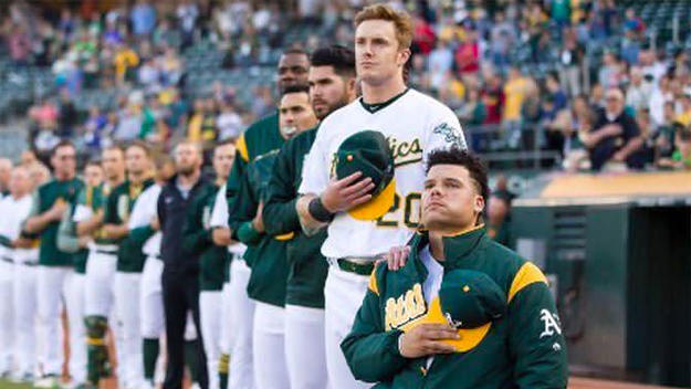 bruce maxwell kneeling during national anthem