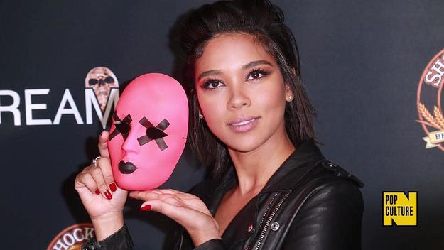 Alexandra Shipp with a 'Tragedy Girls' mask