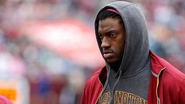 Robert Griffin III stands near the bench against the Philadelphia Eagles at FedEx Field.