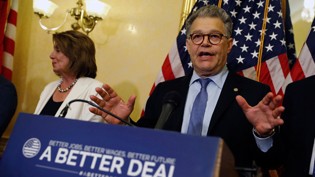 Sen. Al Franken speaks at a news conference