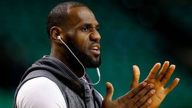 LeBron James rubs his hands together.