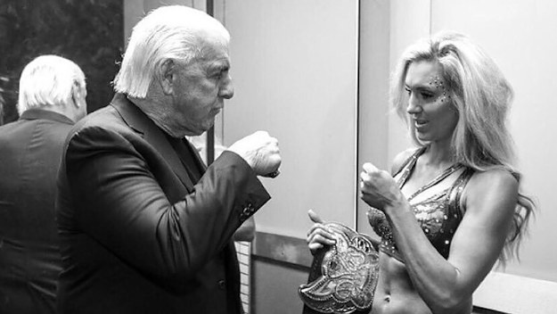 Charlotte Flair shares a photo of her and father Ric on Instagram.