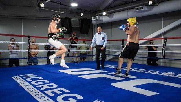 Conor McGregor and Paulie Malignaggi spar.