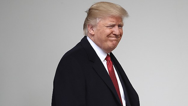 Donald Trump walks to a waiting Marine One helicopter