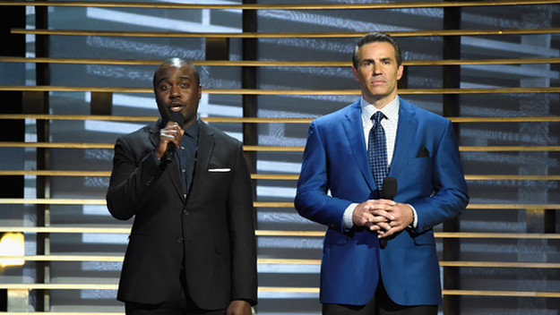 Marshall Faulk and Kurt Warner speak onstage at A+E Networks 'Shining A Light' concert