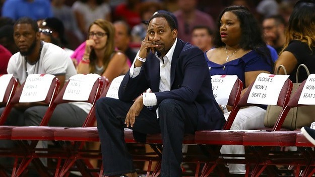 Stephen A. Smith sits courtside at a Big3 game.