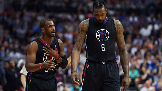 Chris Paul and DeAndre Jordan exchange words on the floor.