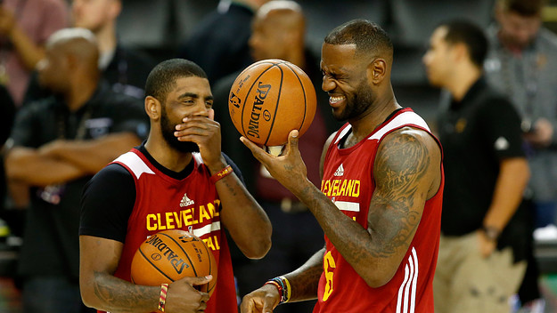 LeBron James and Kyrie Irving share a laugh.