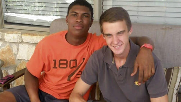 Bakari Henderson, left, is pictured in Austin, Texas with friend Travis Jenkins.