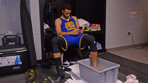 Steph Curry Ice Bin Cell Phone Warriors Spurs Getty 2017