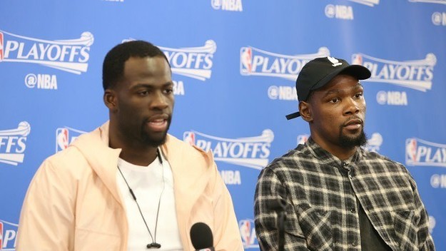 Draymond Green and Kevin Durant attend a press conference during the 2017 NBA Playoffs.