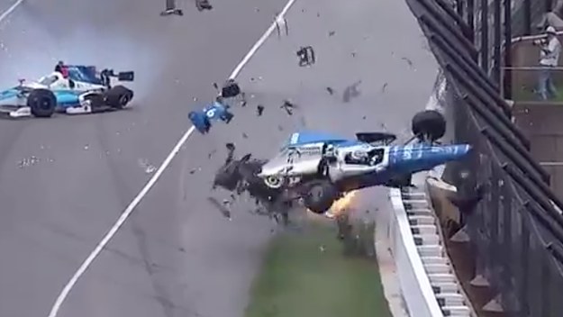 Driver collides into fence at Indianapolis 500.