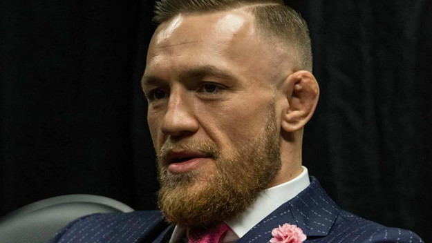 Conor McGregor's "F*CK YOU" pinstripe suit