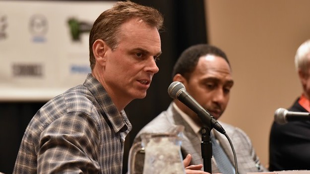 Colin Cowherd speaks on a panel.