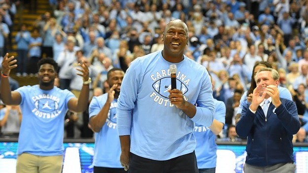 Michael Jordan gives a speech during a UNC basketball game.