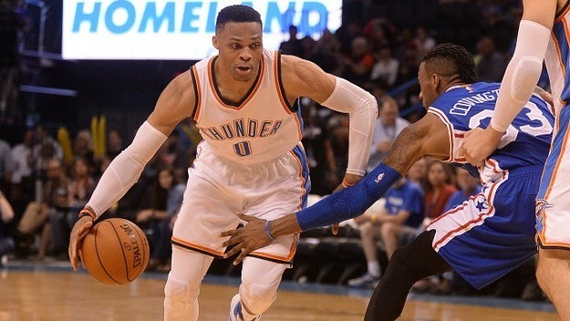 Russell Westbrook drives against the 76ers.