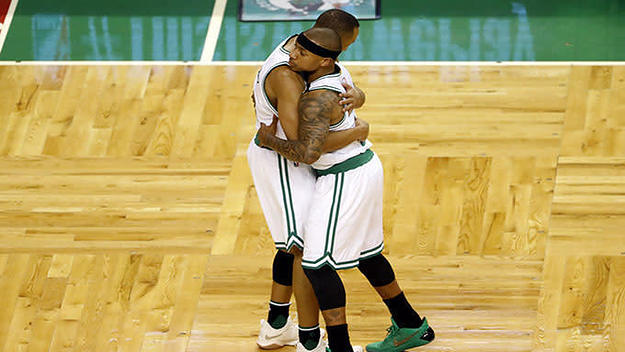 isaiah thomas celtics being hugged