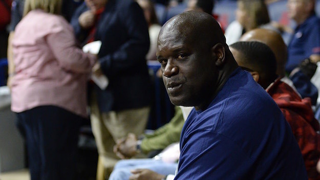 Shaq caught by camera while attending game.