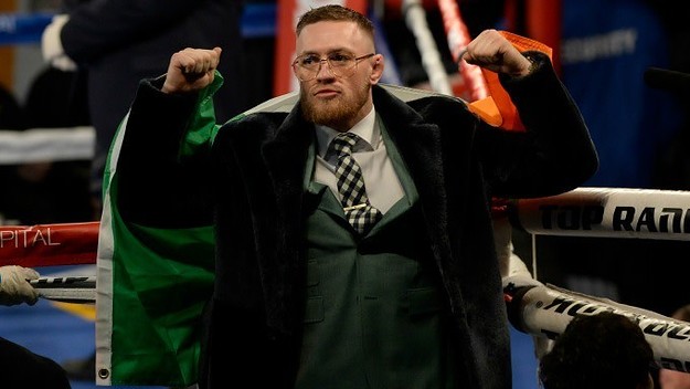 Conor McGregor attends a boxing match.