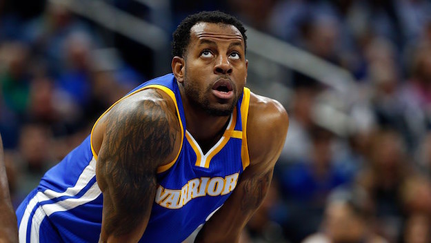 Andre Iguodala puts his hands on his knees during game.