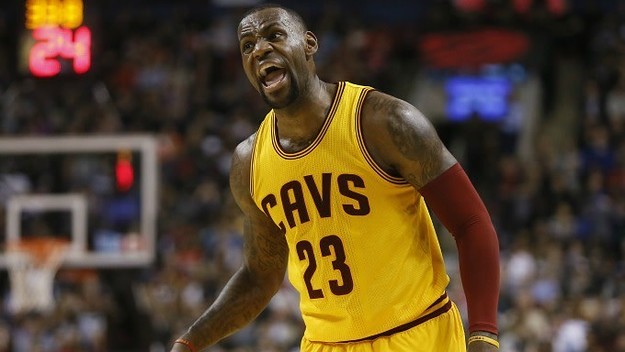 LeBron James yells at a teammate.