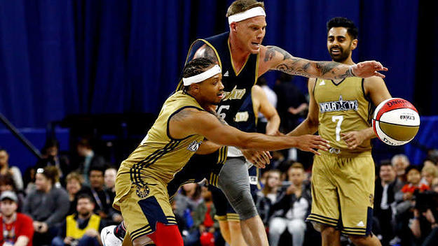 Romeo Miller battles with Jason Williams for a loose ball over All Star weekend.