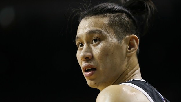 Jeremy Lin reacts to a call during a Nets game.