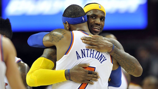LeBron James and Carmelo Anthony hug one another.
