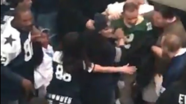Cowboys fans beat up a Packers fan.