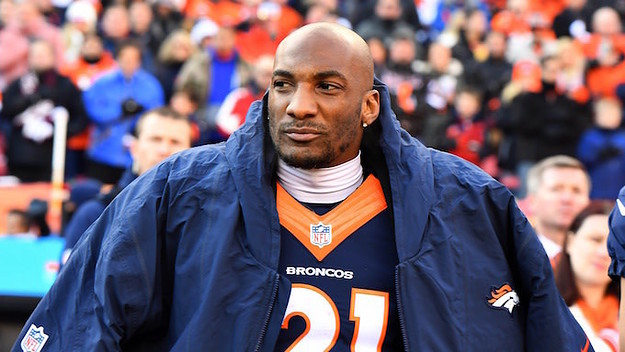 Aqib Talib watches game from the sidelines.