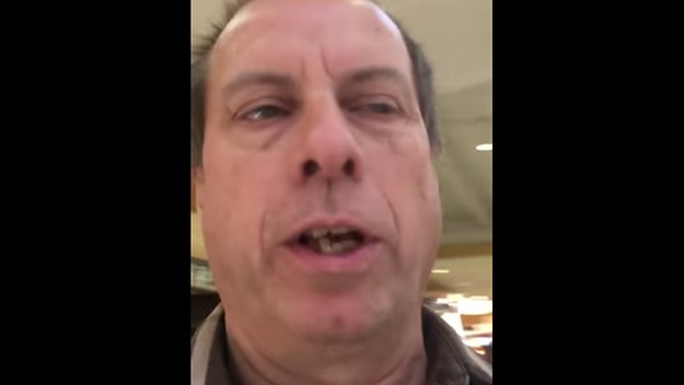 A screen shot from a YouTube video showing a pastor yelling at kids about Santa.