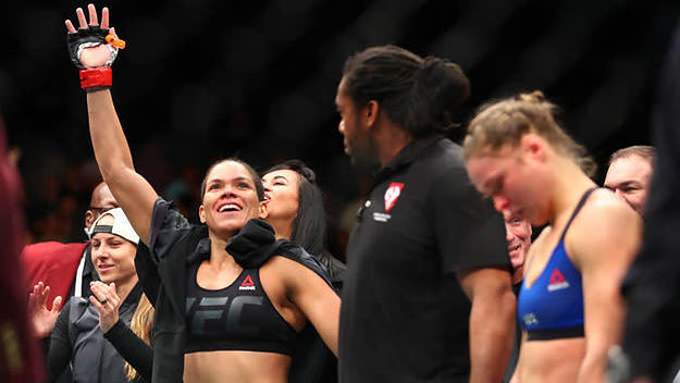 Amanda Nunes celebrates her victory over Ronda Rousey at UFC 207.
