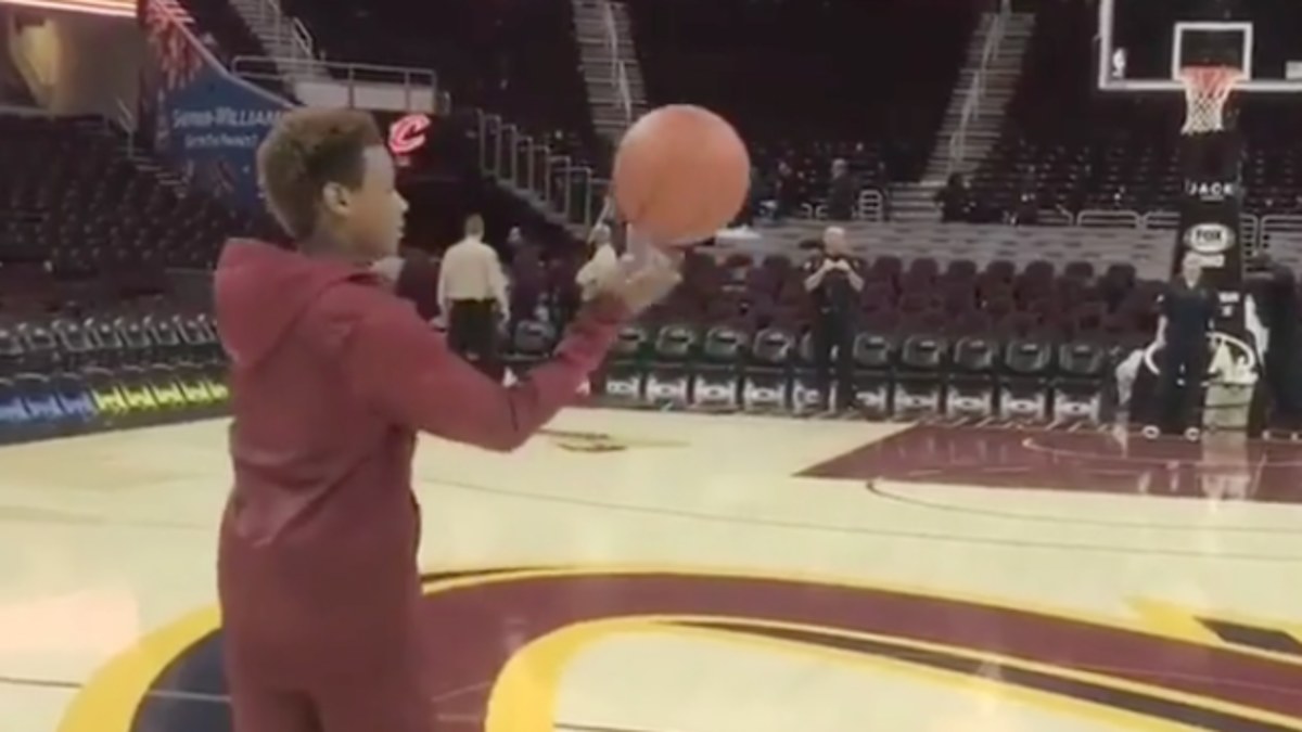 LeBron James's son Bronny tries half court shot after Cavaliers game.