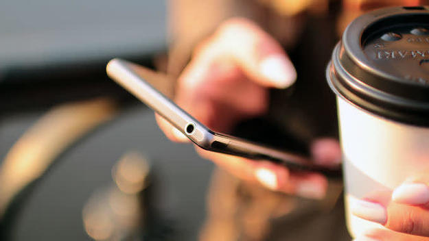 Person with phone in hand.