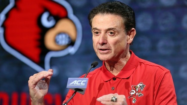 Rick Pitino speaks at a press conference