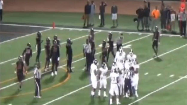 A lineman for Mt. SAC punches a referee during a game.